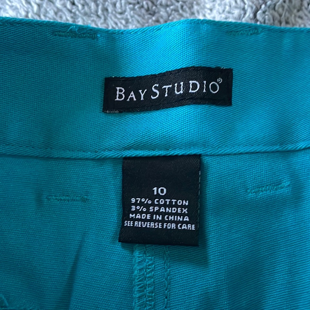Longer teal shorts